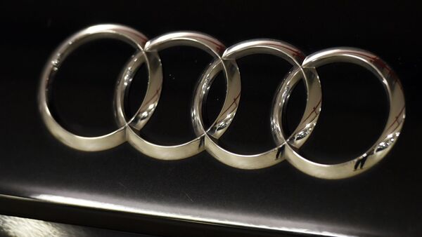 Die Ringe vom Audi-Logo., © Caroline SeidSeidel-Dißmannel/dpa/Symbolbild