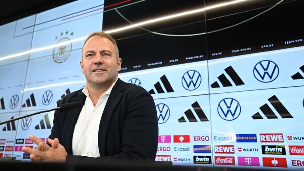 Erwartet seine WM-Spieler in Frankfurt: Bundestrainer Hansi Flick., © Arne Dedert/dpa